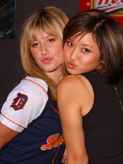 Brenda Song and Ashley Tisdale posing for the camera