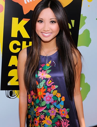 She always seems to be smiling, Brenda Song in black with flowers
